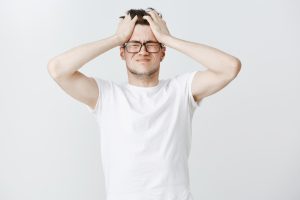 troubled exhausted young man grab head close eyes from overthinking1